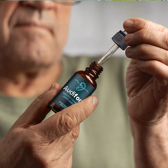 Close-up of the Audifort bottle and dropper, demonstrating the easy-absorption liquid form for hearing support.